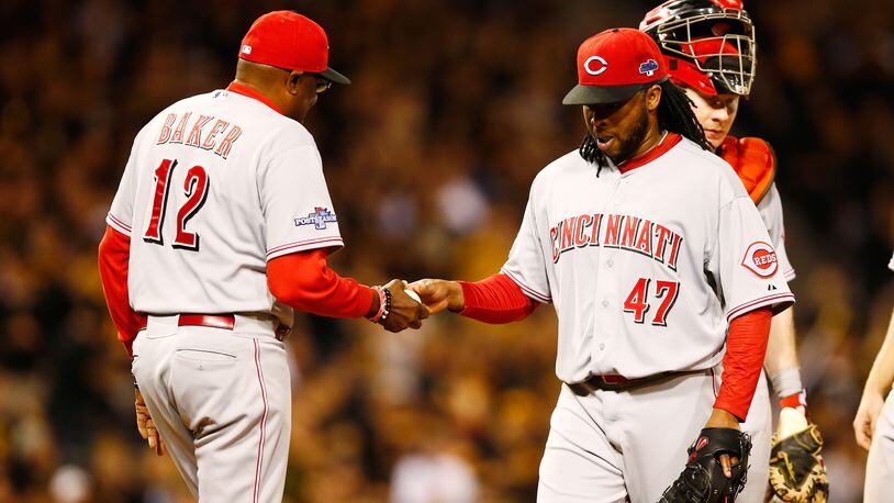 PITTSBURGH, PA - OCTOBER 01: Manager Dusty Baker #12 pulls Johnny Cueto #47 of the Cincinnati Reds in the fourth inning against the Pittsburgh Pirates during the National League Wild Card game at PNC Park on October 1, 2013 in Pittsburgh, Pennsylvania. (Photo by Justin K. Aller/Getty Images)