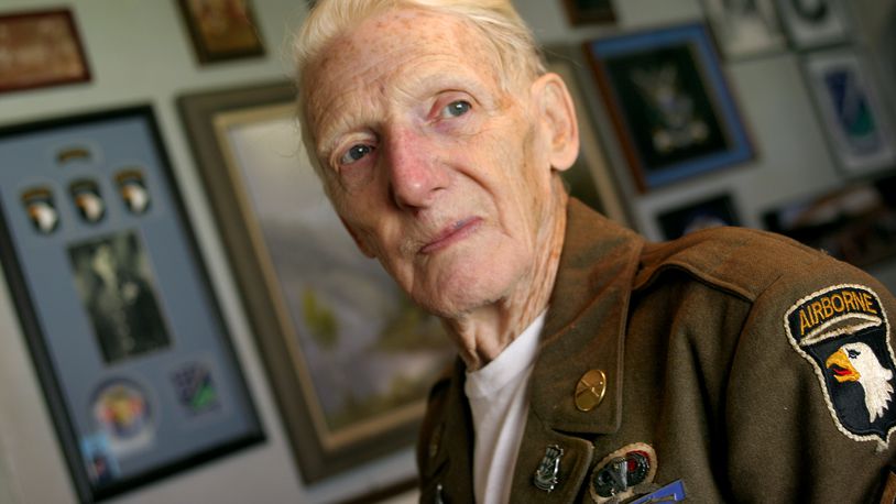 Jim Martin was a member of the 101st Airborne Division on D Day. He and his group jumped 25 miles behind enemy lines the night before the invasion under heavy German artillery fire. He also saw action in Holland, the Battle of the Bulge, and Germany, liberating a concentration camp and Hitler's Bavarian home. He was awarded two Purple Hearts and a Bronze Star. STAFF PHOTO BY BILL REINKE.