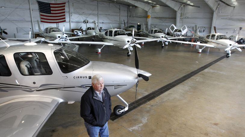 Don Smith, manager of the Lewis A. Jackson Regional Airport in Xenia, stands in one of the hangers. The county regional airport may be expanding and moving toward increasing commercial activity in hopes of boosting revenues. LISA POWELL / STAFF