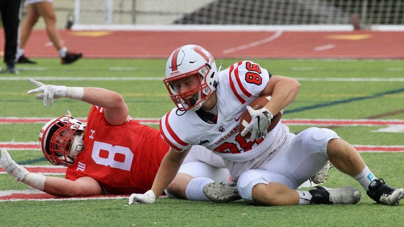 Jake Quosig, of SUNY Cortland, reacts after catching a touchdown against Wittenberg's Liam Wooldridge on Saturday, Sept. 4, 2021, at Edwards-Maurer Field in Springfield. David Jablonski/Staff