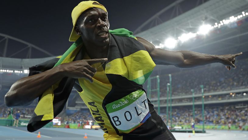 Jamaica's Usain Bolt celebrates after winning the gold in the men's 100-meter final during the athletics competitions in the Olympic stadium of the 2016 Summer Olympics in Rio de Janeiro, Brazil, Sunday, Aug. 14, 2016. (AP Photo/Matt Slocum)