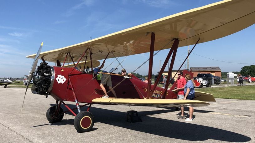 Vintage biplanes from years past gave rides to the public and could be explored on the ground during the annual Barnstorming Carnival at Springfield-Beckley Municipal Airport on Saturday. The event continues Sunday. Photo by Brett Turner