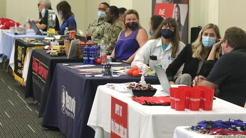 Employers wait for people at the Annual Clark County Career Fair that was held last year. BILL LACKEY/STAFF