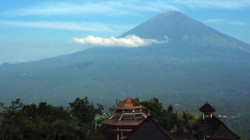 BALI, INDONESIA - SEPTEMBER 28: A general view of Mount Agung is seen from Lempuyang Temple in Lempuyang village of Karangasem Regency, Bali, Indonesia on September 28, 2017. After Mount Agung's alert phase reached critical, the tourist destination and the local Hindus praying place Lempuyang Temple is now deserted from tourists. (Photo by Mahendra Moonstar/Anadolu Agency/Getty Images)