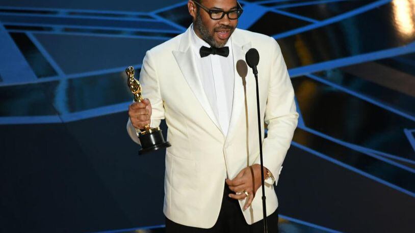 HOLLYWOOD, CA - MARCH 04:  Writer/director Jordan Peele accepts Best Original Screenplay for 'Get Out' onstage during the 90th Annual Academy Awards at the Dolby Theatre at Hollywood & Highland Center on March 4, 2018 in Hollywood, California.  (Photo by Kevin Winter/Getty Images)