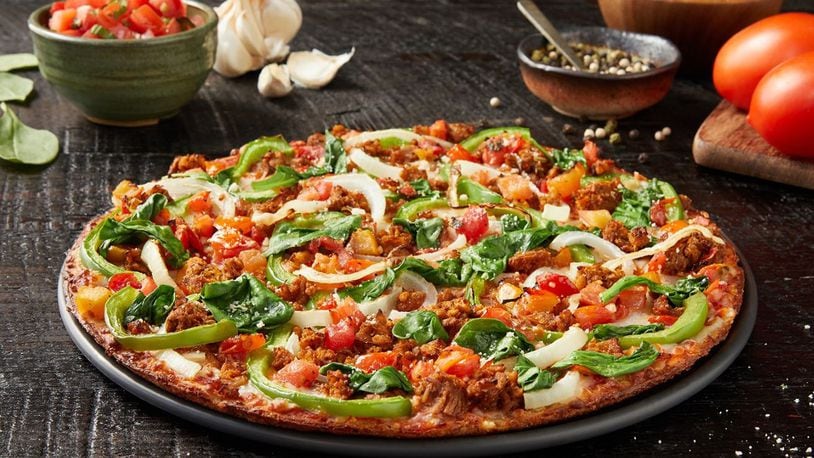 Donatos Cauliflower Bruschetta Pizza, one of three new signature pizzas from the Columbus-based Donatos chain that features a cauliflower crust and plant-based sausage.