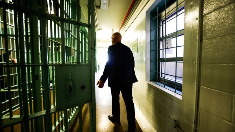 Greene County Police Major Kirk Keller walks through the third story of the Greene County Jail. The jail was built in the 1960s and Keller hopes Greene County residence will pass a sales tax to replace the aging building. JIM NOELKER/STAFF