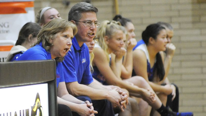 Carroll girls coach Cecilia Grosselin (left) and assistant Mike Austria have led the Patriots to a 15-0 season and the No. 1 ranking in D-II. MARC PENDLETON / STAFF