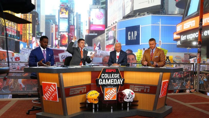NEW YORK, NY - SEPTEMBER 23:  Lee Corso, Kirk Herbstreit, Chris Fowler are seen during ESPN's College GameDay show at Times Square on September 23, 2017 in New York City.  (Photo by Mike Stobe/Getty Images)