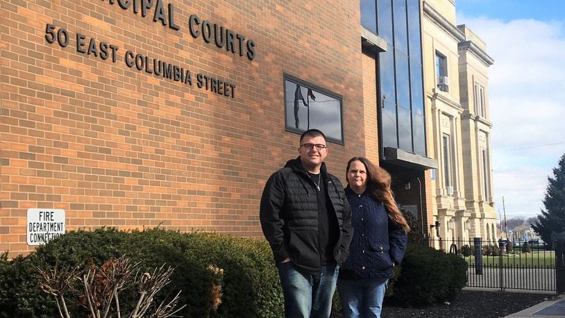 Eric Mata stands next to Tracie Bishop in front of the Clark County Municipal Court building. They formed the Substance Abuse Prevention Institute last year that offers programs to OVI offenders. HASAN KARIM/ STAFF
