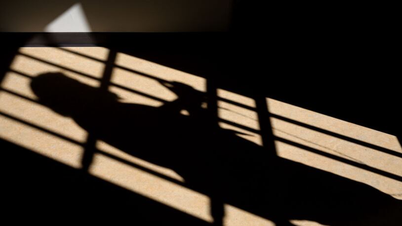 A shadow is cast of a prison cell door.  (Photo: Dan Kitwood/Getty Images)