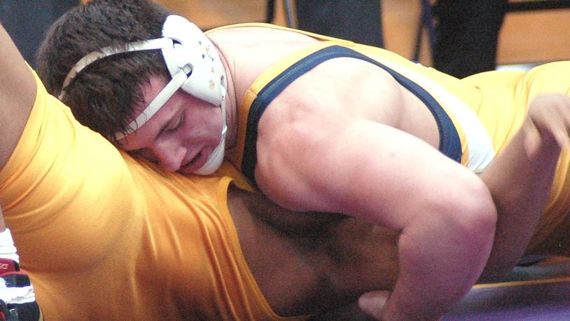 Springfield’s Joe Cochran works for the fall during his 195-pound title match at the GWOC tournament Saturday at Butler High School. Cochran claimed his second title with a fall in 5:33. JOHN CUMMINGS / CONTRIBUTED