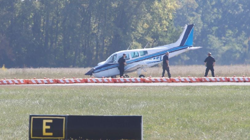 Emergency personnel responded Monday afternoon following a report of a plane that reportedly had landing gear issues at Springfield-Beckley Airport. BILL LACKEY/STAFF