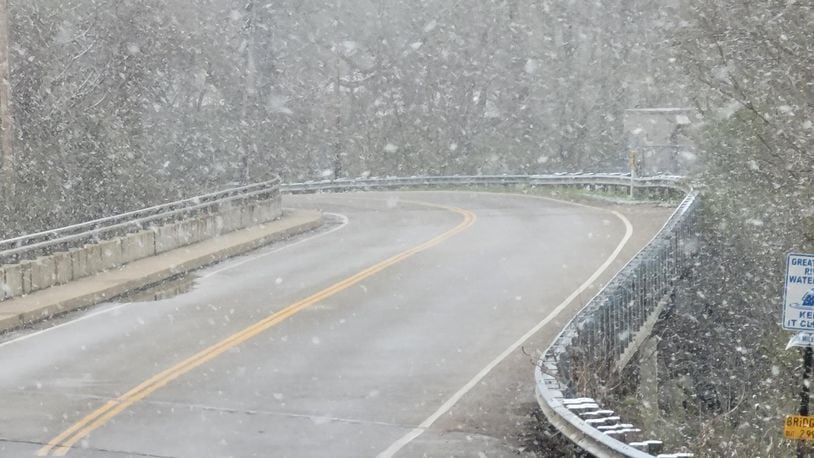 Snow was falling in Butler County on Thursday, April 1, 2021. NICK GRAHAM / STAFF