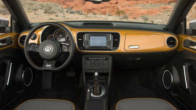 The interior repeats the special paint color with it appearing all along the dashboard and side panels as well as in the stitching of the leather seats. Photo by Volkswagen