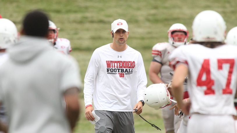 Wittenberg’s Reed Florence coaches at practice on Monday, Aug. 29, 2017, in Springfield. David Jablonski/Staff