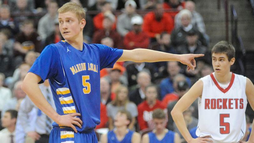 Marion Local senior Nathan Bruns helped the Flyers win a Division IV state championship last season and has signed to play basketball at the University of Findlay. MARC PENDLETON / STAFF