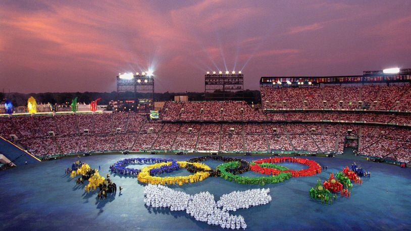 Performers form the Olympic Rings during the Opening Ceremonies of the 1996 Olympic Games on July 19, 1996 at Olympic Stadium in Atlanta, Georgia.