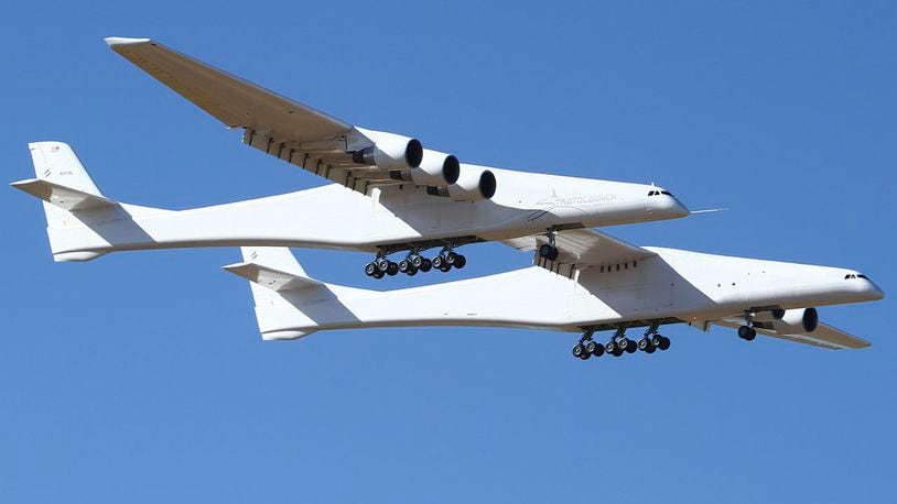 Stratolaunch, a giant six-engine aircraft with the world's longest wingspan , makes its historic first flight from the Mojave Air and Space Port in Mojave, Calif., Saturday, April 13, 2019. Founded by the late billionaire Paul G. Allen, Stratolaunch is vying to be a contender in the market for air-launching small satellites.  (AP Photo/Matt Hartman)