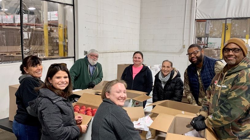 Oesterlen Services For Youth's executive team volunteered at the Second Harvest Food Bank. Contributed