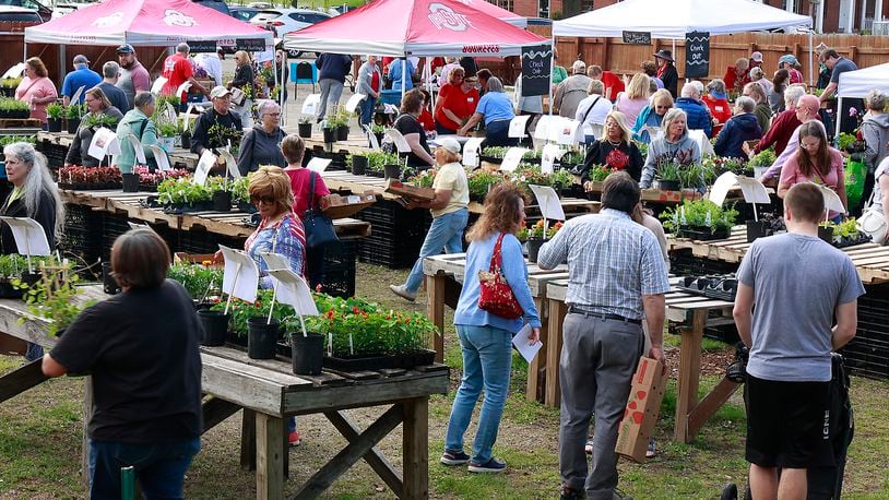 Several events will be held this week in Clark and Champaign Counties, including an open house for those interested in becoming a Master Gardener Volunteer. In this file photo, hundreds of gardeners of all skill levels turned out for the annual Master Gardener Volunteer Plant Sale at the Snyder Park Gardens & Arboretum earlier this year. BILL LACKEY/STAFF
