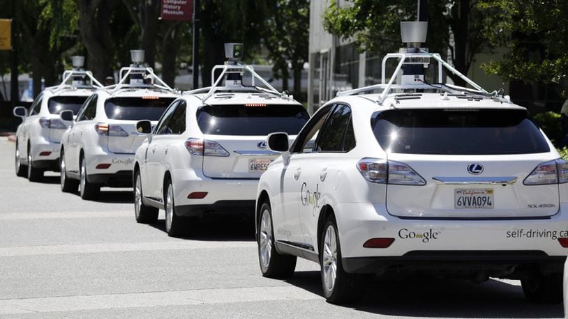 Self-driving vehicles could disrupt major industries, such as trucking and transportation, potentially leading to large job losses. (AP Photo/Eric Risberg, File)