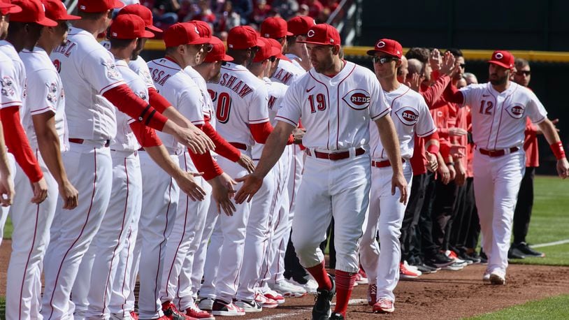 Joey Votto, of the Reds, is introduced before a game against the Pirates on Opening Day on Thursday, March 30, 2023, at Great American Ball Park in Cincinnati. David Jablonski/Staff