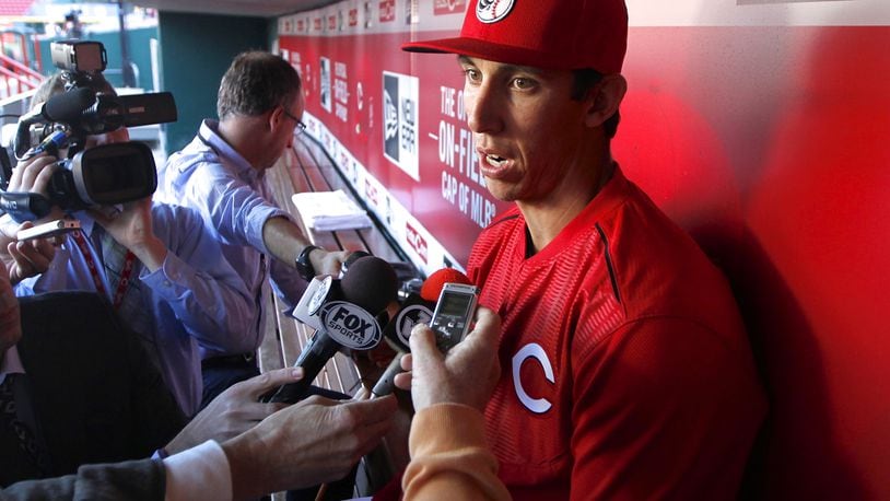 Pitcher Michael Lorenzen speaks to reporters in the Reds dugout on Tuesday, April 28, 2015, at Great American Ball Park in Cincinnati. David Jablonski/Staff