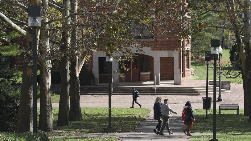 Students walk across campus at Wittenberg University Tuesday, Oct. 26, 2021. BILL LACKEY/STAFF