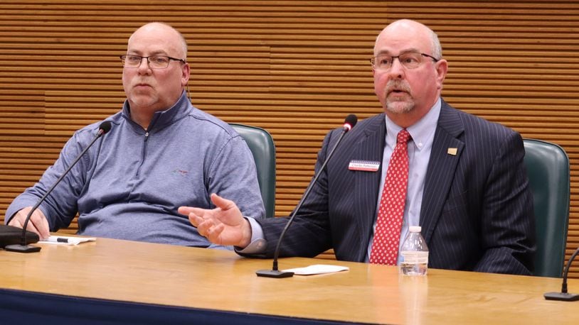Former Clark County Health Commissioner Charlie Patterson (right) speaks to voters as a county commission candidate as candidate Dave Marshall looks on at a primary debate Monday, Feb. 12, 2024. JESSICA OROZCO/STAFF