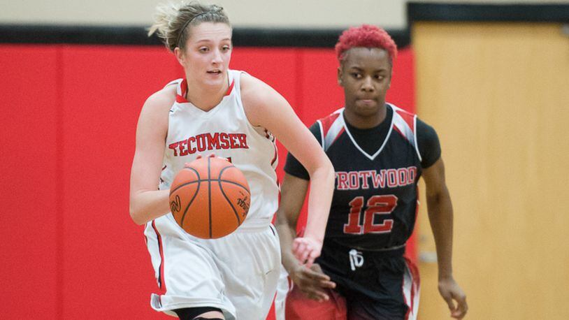 Tecumseh sophomore guard Presley Griffitts dribbles by Trotwood’s Nai Myers during a nonconference game on Monday night at Reynolds Gymnasium. Contributed Photo by Bryant Billing