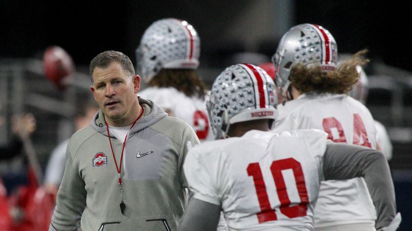 Ohio State’s Greg Schiano watches the team practice at AT&T Stadium on Tuesday, Dec. 26, 2017, in Arlington, Texas. David Jablonski/Staff