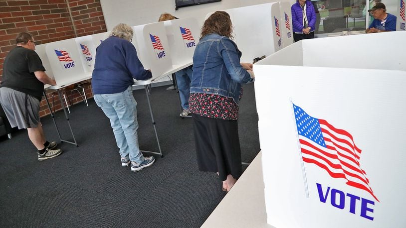 Voters cast their votes at a Springfield election poll during the May 3 primary. A second primary will be held on Aug. 2. BILL LACKEY/STAFF