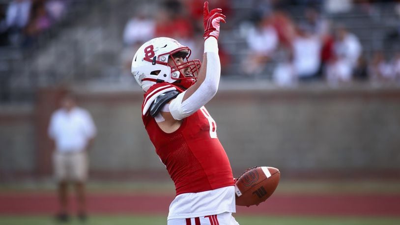 Wittenberg's Troy Teepe celebrates a touchdown against Kenyon on Saturday, Sept. 16, 2023, at Edwards-Maurer Field in Springfield. David Jablonski/Staff