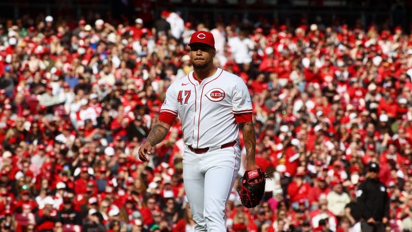 Reds starter Frankie Montas returns to the dugout after the final out of an inning against the Nationals on Opening Day on Thursday, March 28, 2024, at Great American Ball Park in Cincinnati. David Jablonski/Staff