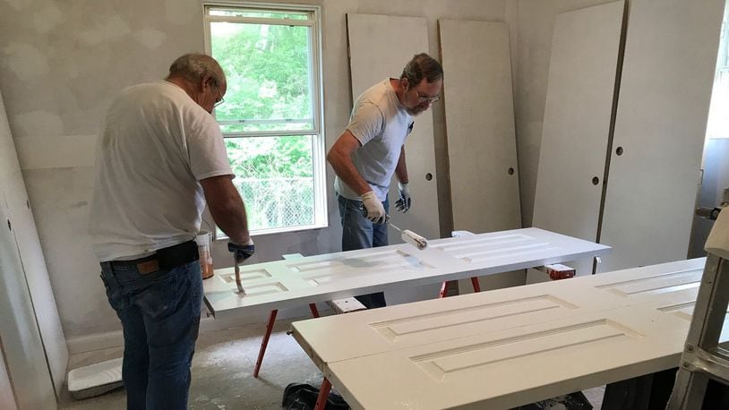 Two volunteers recently worked on a current Clark County Fuller Center for Housing remodeling project, which when finished will make a homeowner out of a single mother of three. CONTRIBUTED