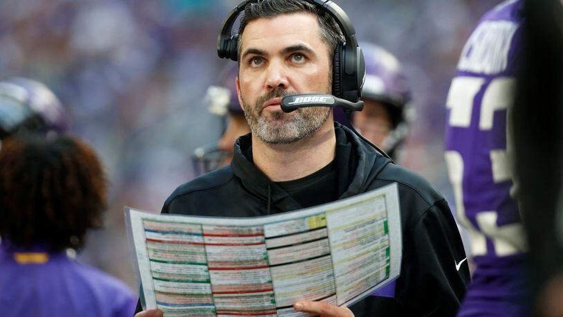 In this Dec. 16, 2018, file photo, Minnesota Vikings interim offensive coordinator Kevin Stefanski watches from the sideline during the first half of an NFL football game against the Miami Dolphins in Minneapolis. The Cleveland Browns are hiring Stefanski as their new coach, a person familiar with the decision told the Associated Press. Stefanski agreed to accept the position Sunday, Jan. 12, 2020, a day after Minnesota was beaten by San Francisco in the NFC playoffs, according to the person who spoke to the AP on condition of anonymity because the team has not announced the decision. (AP Photo/Bruce Kluckhohn, File)