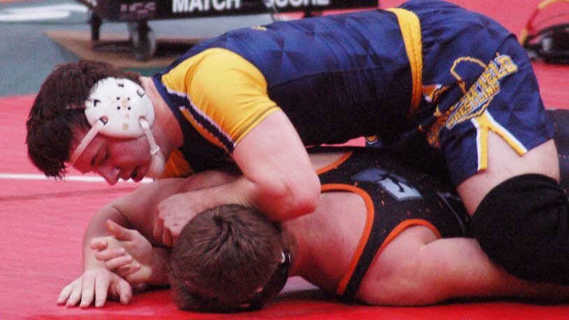 Springfield senior Joe Cochran (top) was third at 220 pounds in last month’s Division I state wrestling meet at Columbus. JOHN CUMMINGS / CONTRIBUTOR