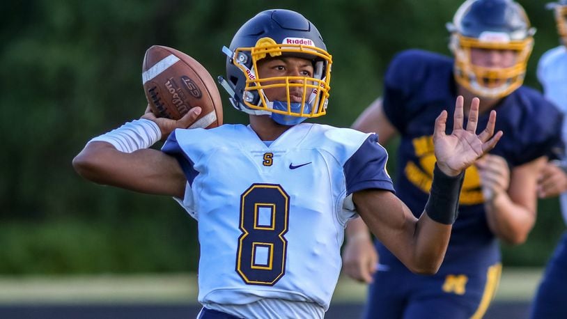 Springfield High School sophomore quarterback Te’Sean Smoot prepares to throw the ball during the Wildcats’ game against Moeller on Friday night at Springfield. CONTRIBUTED PHOTO BY MICHAEL COOPER
