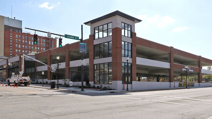 A parking garage in downtown Springfield that opened in May will be free to use for the rest of the year.  BILL LACKEY/STAFF
