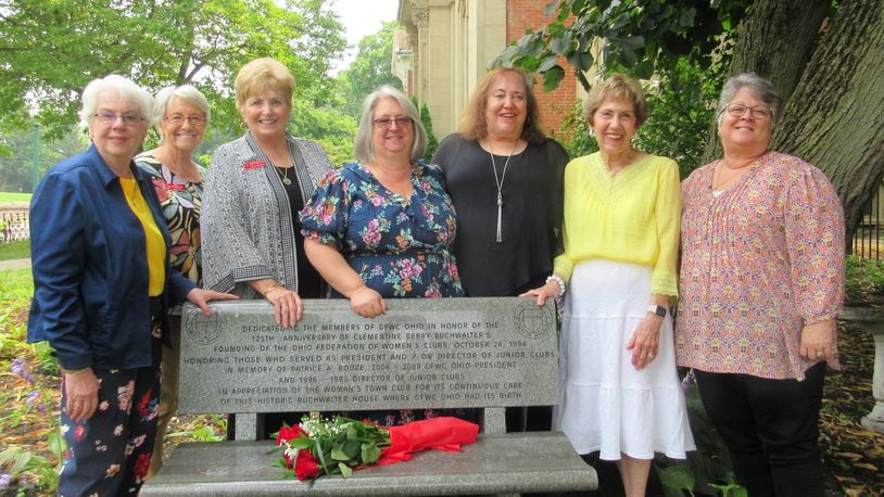 A new memorial bench was dedicated last weekend at the Woman’s Town Club in celebration of the club founder and in memory of a former club president. 
From left to right: GFWC Ohio members Rae Jane Araujo, Judy Frum, Project Chair Rose Logston, Carol Christy, Jackie Lang, Sallie Kegley, and Karen Kessen with the memorial bench. Contributed