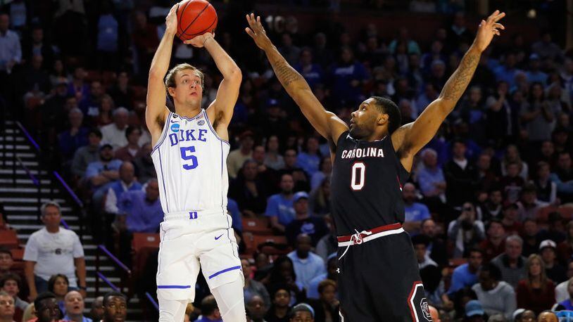 GREENVILLE, SC - MARCH 19: Luke Kennard #5 of the Duke Blue Devils shoots the ball against Sindarius Thornwell #0 of the South Carolina Gamecocks in the first half during the second round of the 2017 NCAA Men’s Basketball Tournament at Bon Secours Wellness Arena on March 19, 2017 in Greenville, South Carolina. (Photo by Kevin C. Cox/Getty Images)