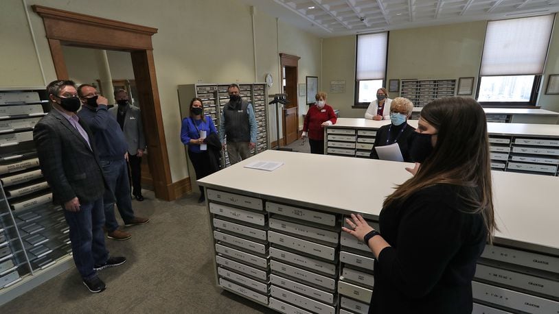 Clark County Clerk of Courts Melissa Tuttle, right, talks about the Recorders Office during a tour of the newly renovated A.B. Graham Building on Feb. 25.  BILL LACKEY/STAFF