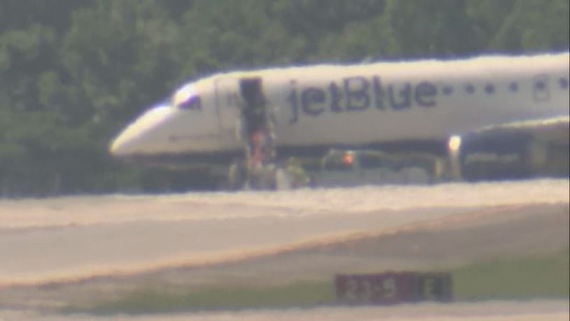 Charlotte Douglas International Airport officials say there is an investigation following a security incident on an aircraft.