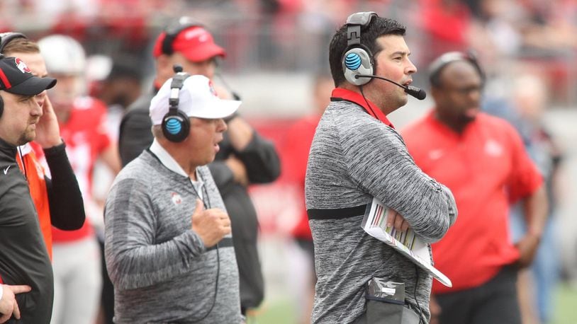 Ohio State quarterbacks coach and co-offensive coordinator Ryan Day watches the spring game on Saturday, April 14, 2018, at Ohio Stadium in Columbus. David Jablonski/Staff