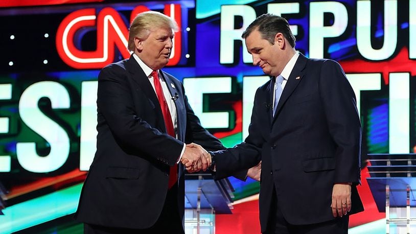 CORAL GABLES, FL - MARCH 10: Republican presidential candidates Donald Trump and Sen. Ted Cruz (R-TX) shakes hands on stage as they arrive for the CNN, Salem Media Group, The Washington Times Republican Presidential Primary Debate on the campus of the University of Miami on March 10, 2016 in Coral Gables, Florida. (Photo by Joe Raedle/Getty Images)