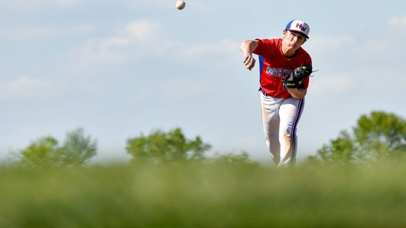 Northwestern’s Gage Voorhees throws a pitch during their 2-0 loss to Carlisle in their Division III sectional baseball final Wednesday, May 18 at Tecumseh High School in New Carlisle. NICK GRAHAM/STAFF