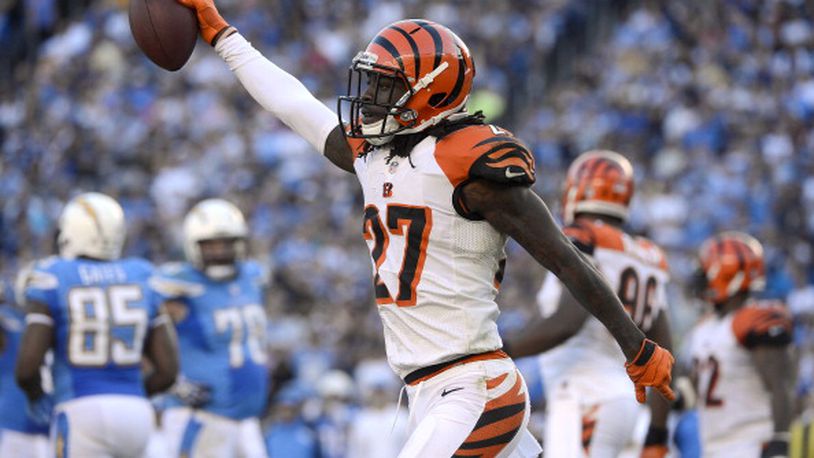 SAN DIEGO, CA - DECEMBER 1: Dre Kirkpatrick #27 of the Cincinnati Bengals recovers a fumble against the San Diego Chargers on December 1, 2013 at Qualcomm Stadium in San Diego, California. (Photo by Donald Miralle/Getty Images)