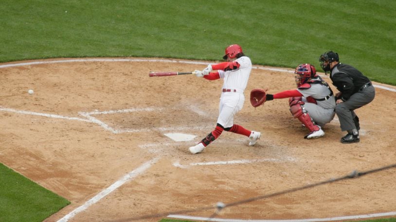 Jonathan India, of the Reds, singles against the Cardinals on Thursday, April 1, 2021, at Great American Ball Park in Cincinnati. David Jablonski/Staff