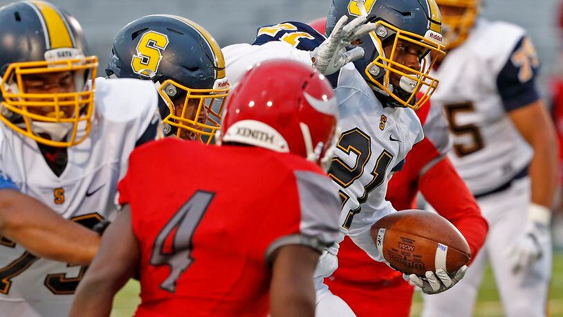 Springfield’s Tavion Smoot carries the ball for a touchdown against Princeton last season. Springfield quarterback Leonard Taylor lateraled the ball to Smoot as he was tackled. Bill Lackey/Staff